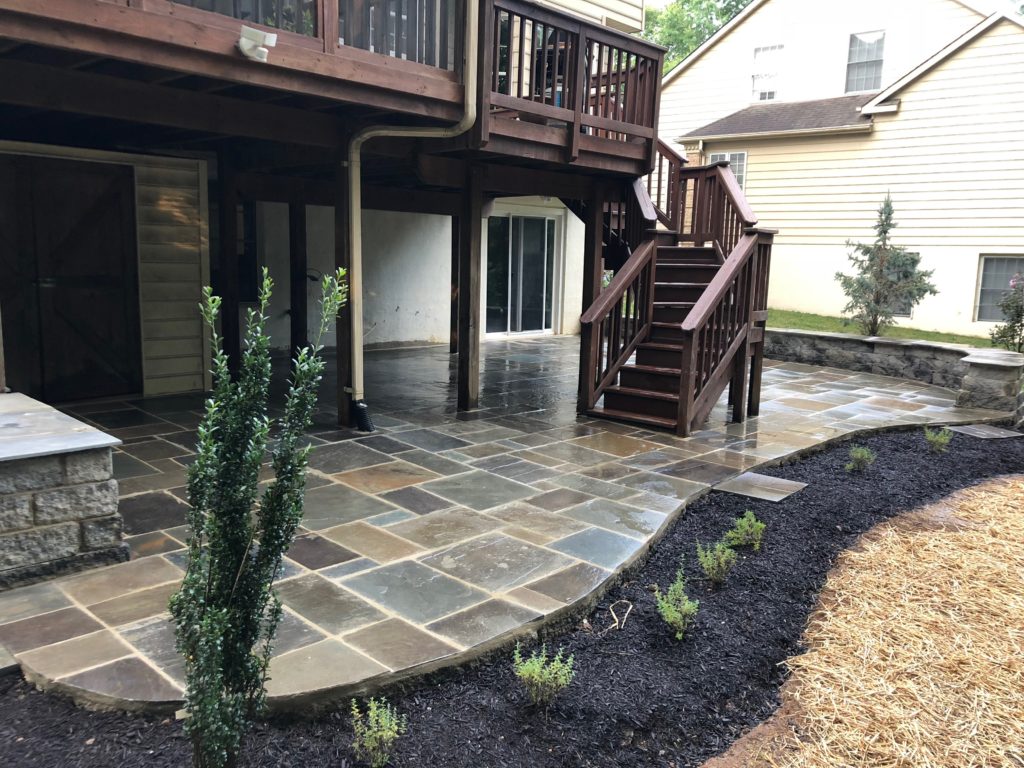 Beautiful wrap around patio - by hardscaping and landscaping company in Baltimore, MD