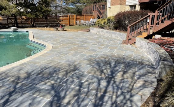 patio around pool by ProLandscapes in MD