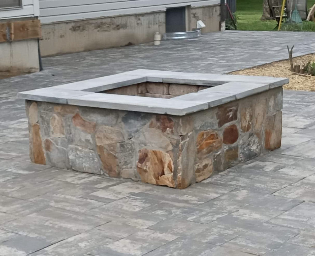 Stone Fire pit by ProLandscapes in MD