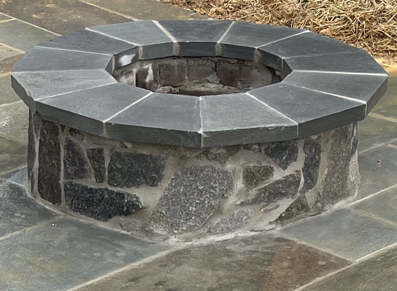 Stone Fire pit by ProLandscapes in MD